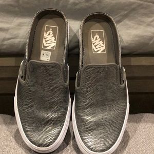 Vans slip on sneakers.